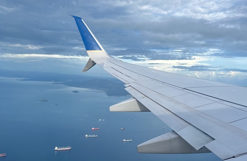 Airplane,Wing,Over,Panamã¡,,Boats,On,The,Sea,(panama,,2022) transport air and sea